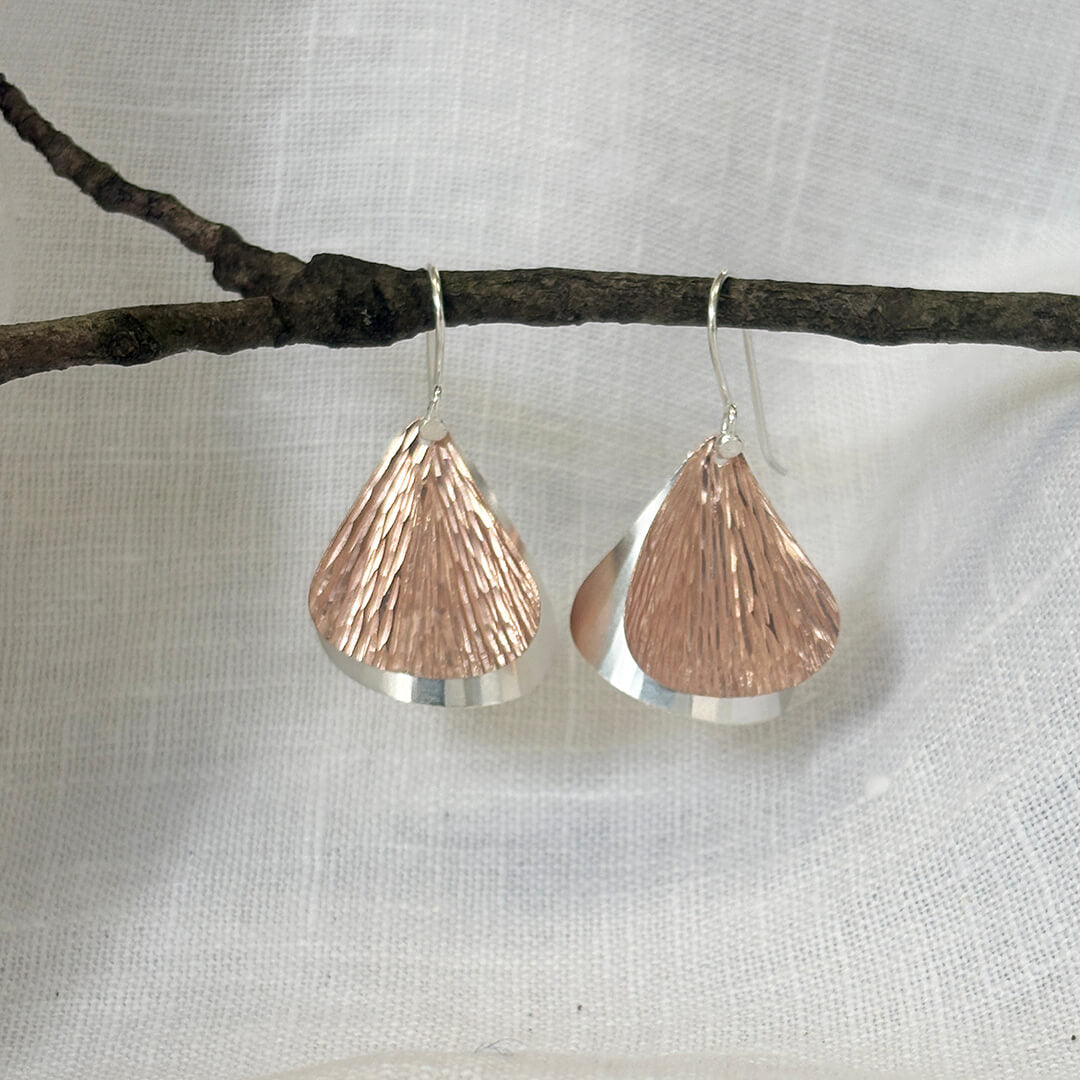 Handmade sterling silver and rose gold textured petal earrings with layered mixed metal design – artisan nature inspired jewelry gift for women