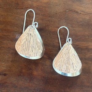 Handmade sterling silver and rose gold textured petal earrings with layered mixed metal design – artisan nature inspired jewelry gift for women