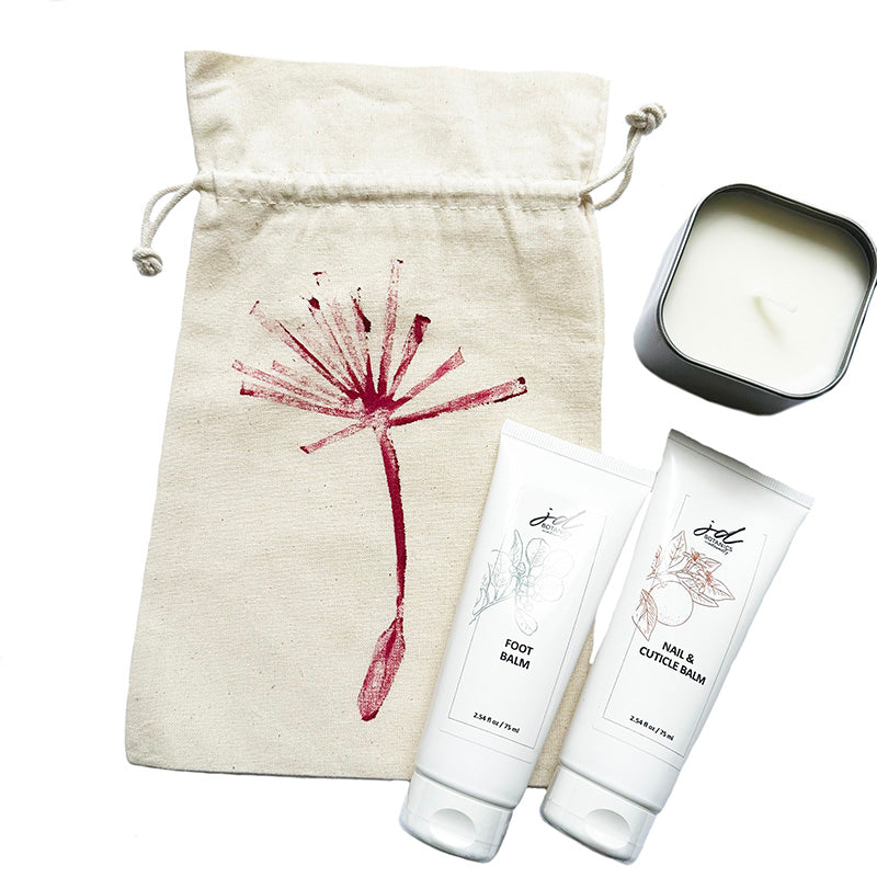 gift bag with nail cuticle cream and foot balm
