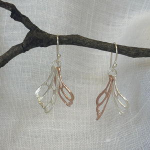 Handmade sterling silver and rose gold butterfly wing earrings with delicate mixed metal artisan design – nature inspired jewelry gift for women