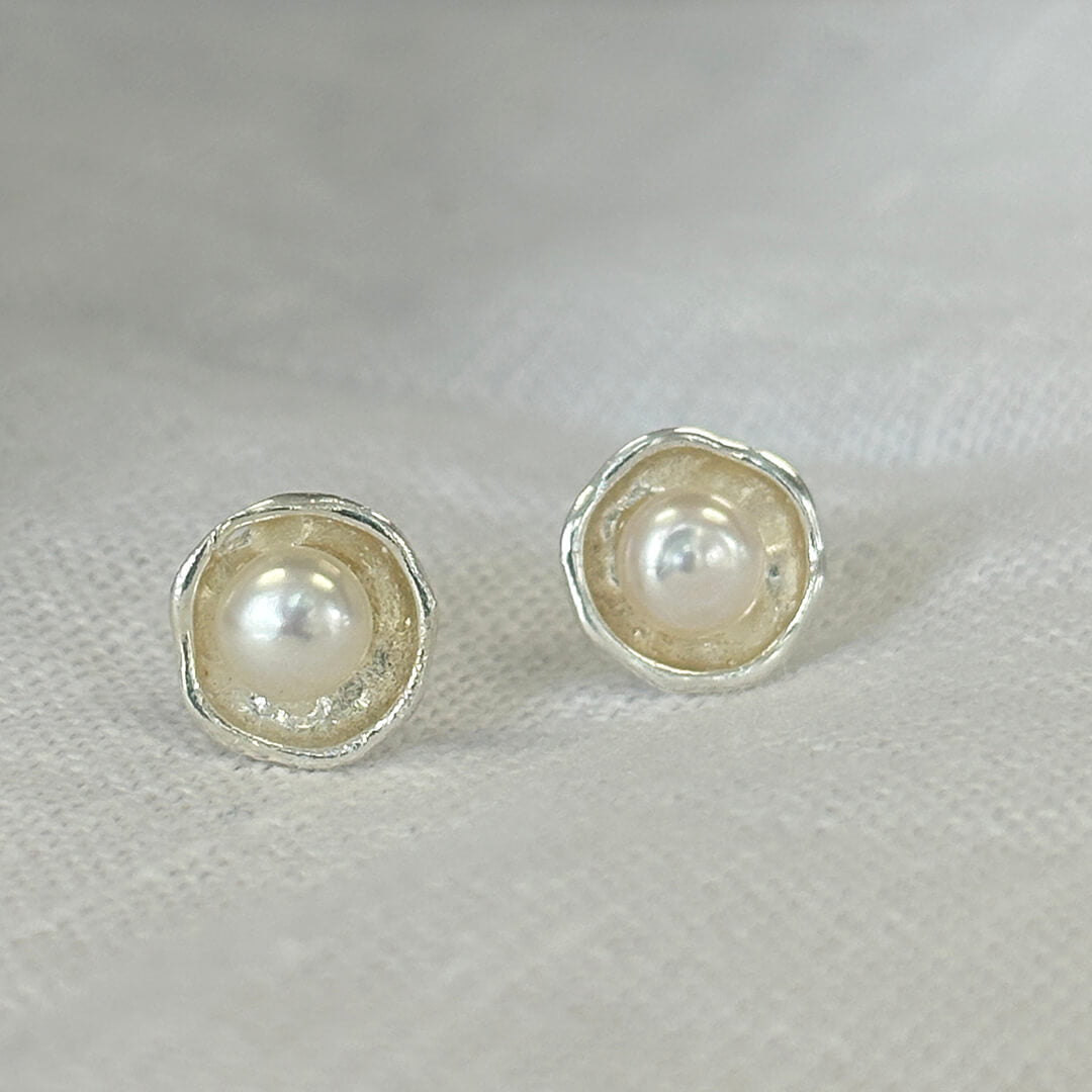 Handmade sterling silver freshwater pearl stud earrings with organic artisan silver setting – timeless pearl jewelry gift for women