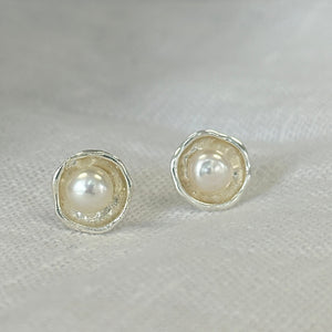 Handmade sterling silver freshwater pearl stud earrings with organic artisan silver setting – timeless pearl jewelry gift for women