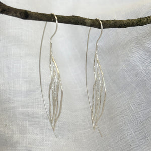 Handmade sterling silver willow leaf earrings with delicate openwork botanical design – lightweight artisan long drop jewelry gift for women
