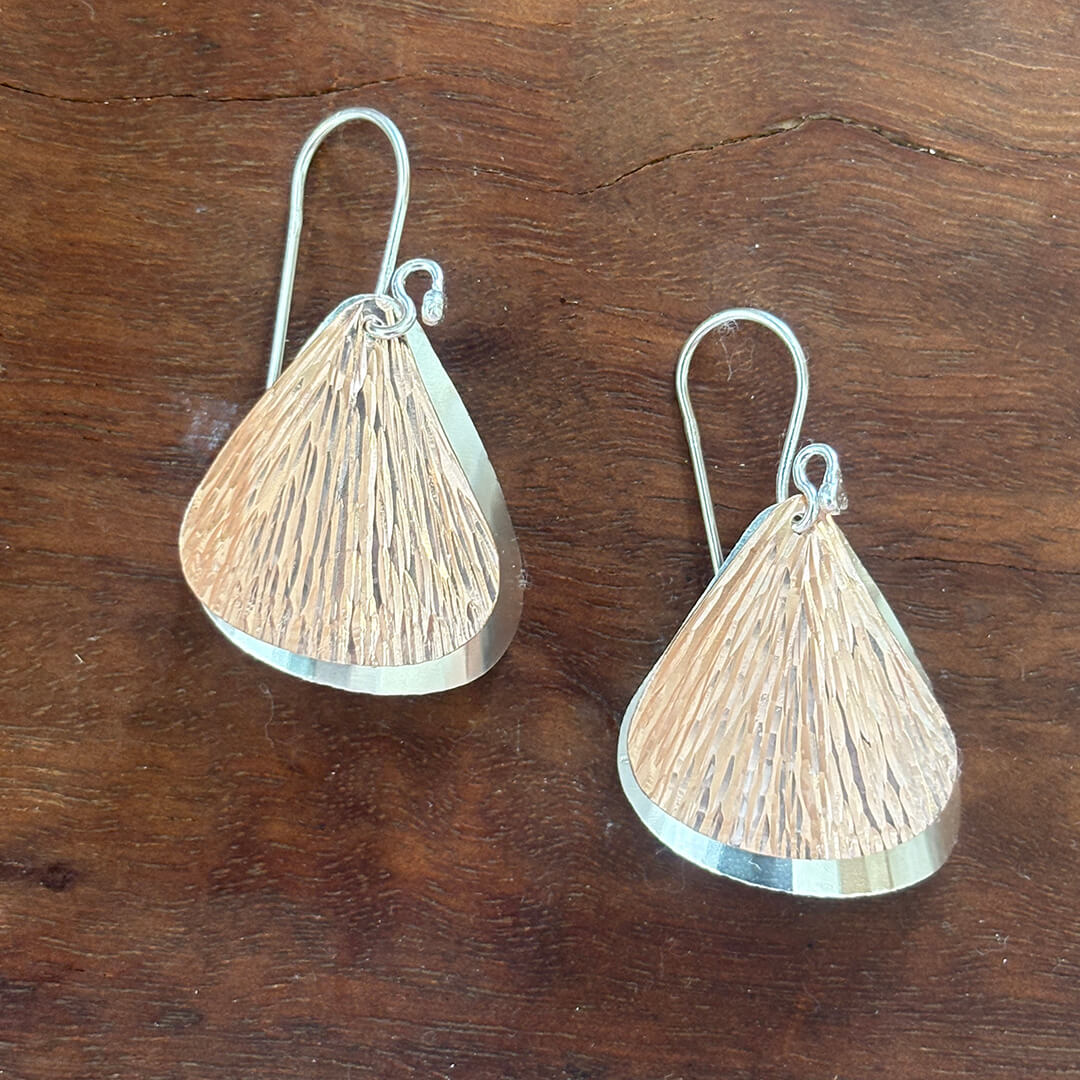 Handmade sterling silver and rose gold textured petal earrings with layered mixed metal design – artisan nature inspired jewelry gift for women