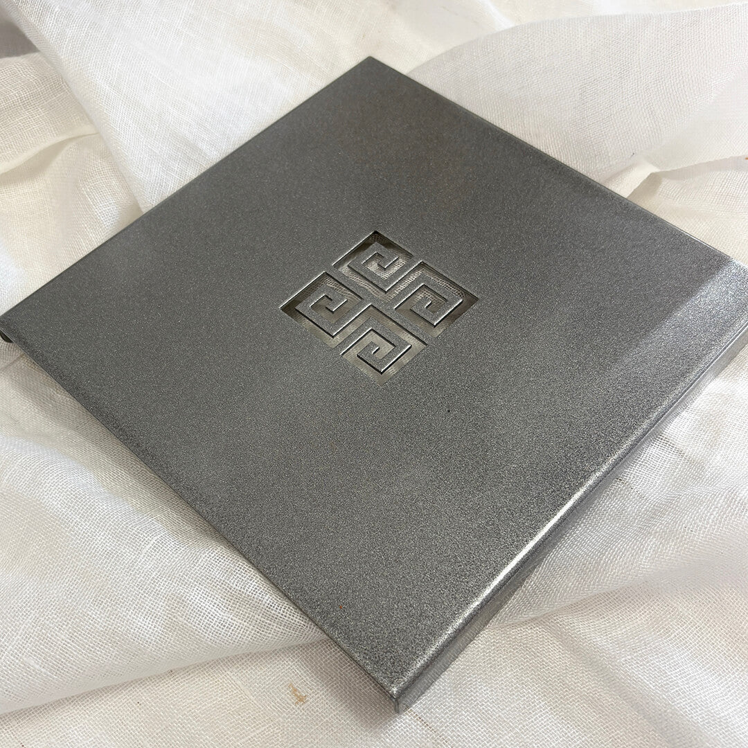 Tintown Geometric Steel Trivet in Silver