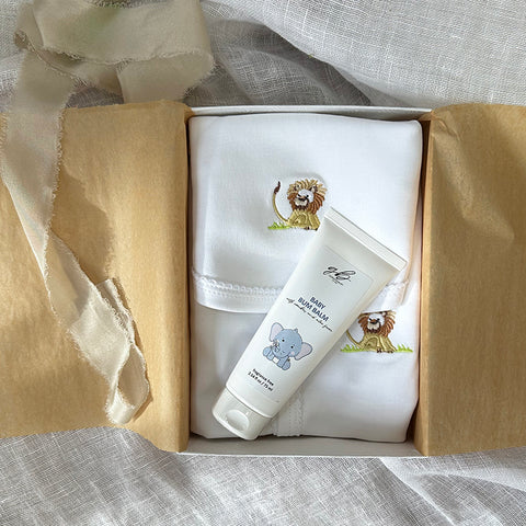 newborn baby gift set with lion onsie bib and diaper cream