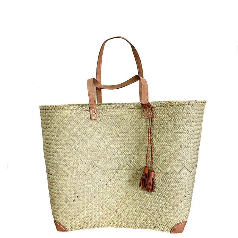penjy natural market bag with leather handle and tassles
