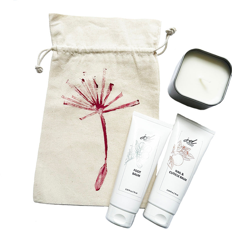 gift bag with nail cuticle cream and foot balm